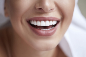 How do teeth become discolored?